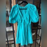 Babydoll mini dress turquoise vneck puff short sleeve pockets bella aqua Blue Size M Photo 1