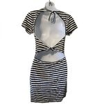 About Us  Black and White short sleeve open back fitted mini dress Photo 1