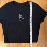 PacSun Black Crop Top—Skeleton riding Skateboard, tag cut out but probably from Photo 1