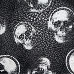 Cool black faux leather zip wristlet with white skull design! Black Photo 2