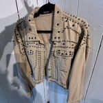 Akira  Tan Jean Fabric with Silver and Black Accent Studs embellished all over. Photo 7