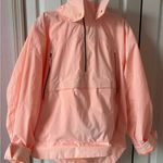 FP Movement Singin’ in the Rain Packable Pullover in Pastel Peach Pink Size XS Photo 4