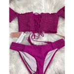 PilyQ New fuchsia smocked bikini set. My bottoms are a slightly different design. Photo 9