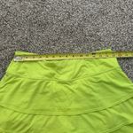 Athleta  neon yellow mini tennis skirt size M Photo 8
