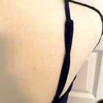 Jun & Ivy | Navy spaghetti strap sundress with embellishments at the waist. Photo 6