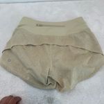 Lululemon Speed Up Mid-Rise Short 4"
Gravel Dust Dew Green Multi / Dew Green 2 Photo 5