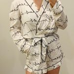 Victoria's Secret Silk Pajama Romper Photo 0