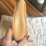 Cult Gaia  LAEL BRASS CLUTCH Photo 4