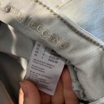 American Eagle light green skinny jeans Photo 3