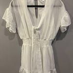 Peach Love  Sheer Sleeve Tie Front Star Embroidered Ruffle Hem Romper Photo 3