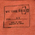 Free People We The  Women’s Size XS Orange Oversized Swing Thermal Waffle Top Photo 3