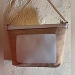 Nanette Lepore Tan Woven Bag with Gold Chain
White leather accents stripe lining Photo 4