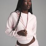 SKIMS Cotton Fleece Shrunken Zip Up Hoodie in Barely Pink, Size Medium Photo 1