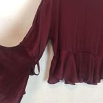 Romeo + Juliet Couture Romeo & Juliet Satin Self Tie Bell Sleeve Peplum Photo 5