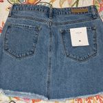 Cello  women's medium denim mini skirt distressed edges light blue zip & button Photo 7