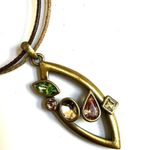 Gold tone rhinestone pendant necklace on cord Photo 7