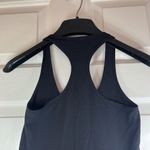 Lululemon Athletica Black Racerback Tank with Ruffle on Bottom Size Small Active Photo 6
