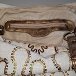 Purse. (B) Gold Photo 7