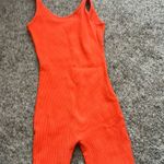 orange ribbed romper Photo 1