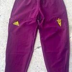Adidas NWT Arizona State Women
Visit Squad Woven Pant Maroon Medium Photo 0