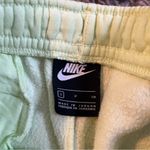Nike  yellow high rise joggers size small Photo 2