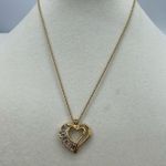 Vintage 1997 Avon Baguette heart necklace. Gold Photo 1