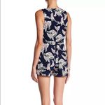 J.O.A. π
Ί Sleeveless Lace-Up Romper Navy Blue Floral Photo 1