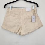 We Wore What  Cream Denim Cut Off Shorts NWT Size 24 Natural Revolve jean shorts Photo 3