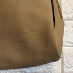 Lacoste  tan vinyl shoulder bag 14”‎ x 10” Photo 1