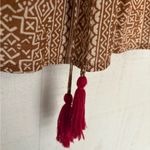 Savanna Jane Bright Long Sleeve Boho Top with Embroidery Design and Tassel Red Photo 5