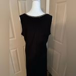 Coco Bianco  sleeveless, black sheath dress with gold chain detail Photo 1
