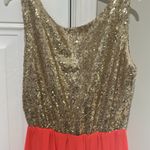 Alythea NWOT party dress. Gold sequins with peace bottom. Never worn and has been in bag Photo 1