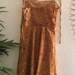 Floral mini dress with adjustable lace up tie knot straps with shirred back detail and invisible side zipper Multi Photo 2