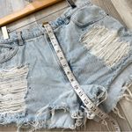 Levi's Furst of a Kind High Rise Distressed Rhinestone Shorts Blue (size 12) Photo 4