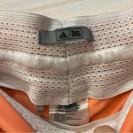 Adidas  Golf Rangewear coral pink orange active  Skort Size small Photo 1