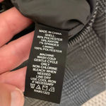 Vince Camuto size 6 a-line faux wrap houndstooth skirt in black / grey. Photo 4