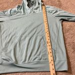 Patagonia  Women's Light Blue Lightweight Hooded Pullover Athletic Top Baselayer Photo 3