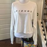 Warner Brothers Official Friends NWT Cropped White Long Sleeve Graphic Tee  PTP: 23 LENGTH: 21 100 % Cotton Photo 0