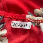 Reverse red floral romper  Photo 2