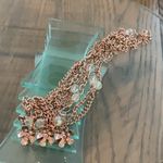 Elegant Gold Layered Necklace with Floral Accents Photo 1