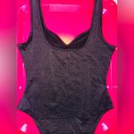 Elegant Black Bodysuit Photo 1