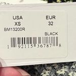 🌺NWT BB DAKOTA STEVE MADDEN BLACK AND YELLOW FLORAL ROMPER SIZE X Photo 7