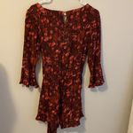Free People  All The Right Ruffles Romper in Berry Photo 80