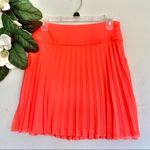 EXPRESS Neon Salmon Pleated Flutter Skirt Size 00 Photo 2