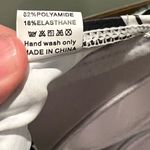 None Black and white geometric print two piece swimsuit women’s medium Photo 10