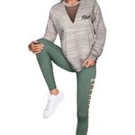 Victoria's Secret VICTORIA’S SECRET-PINK-COOL AND COMFY GREEN LEGGINGS-SIZE SMALL Gorgeous green leggings with open sides Excellent condition  Measurements: Bust: armpit to armpit 12-14 inches  Inseam: 27 inches  Photo 1