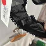 Free People BNWT  spellbound body suit size Small black combo Photo 6