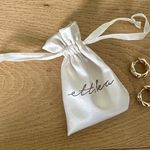 Ettika  - Twisted Hoop Earrings in Gold Tone Photo 0