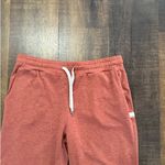 Vuori  Performance Joggers Rust Red Drawstring Pants Size Medium Photo 1