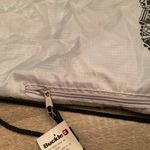 Buckle  sling backpack w zipper pocket Photo 2